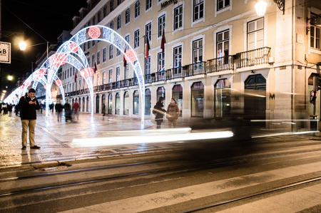 LISBOA, PORTUGAL - NOVEMBER 30: Light trails in Lisbon street (Rua da Prata) on November 30, 2013 in Lisbon, Portugal. Lisbon is the capital and the largest city of Portugal with a population of 547,631のeditorial素材