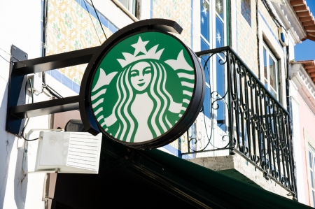 LISBOA, PORTUGAL - DECEMBER 1: Starbucks coffee on Belem District on December 1, 2013 in Lisbon, Portugal. The largest coffeehouse company in the world.のeditorial素材