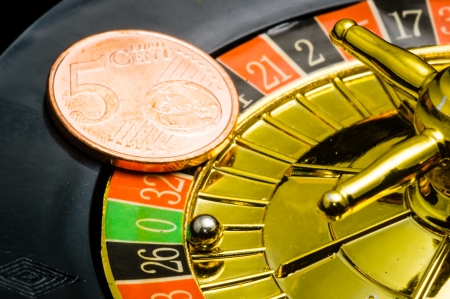 Casino Roulette an five cent coinの写真素材