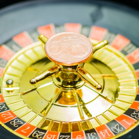 Casino Roulette an five cent coinの写真素材