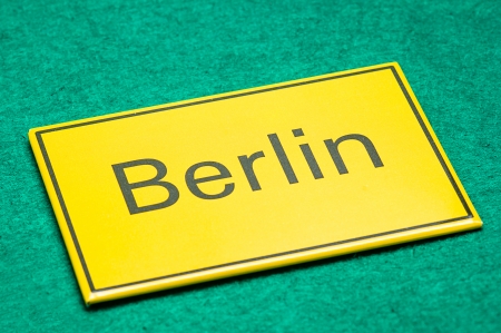 Berlin yellow card on a green floorの写真素材