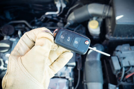 hand holding a car keyの写真素材