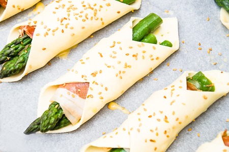 pastry filled with asparagus and prosciuttoの写真素材