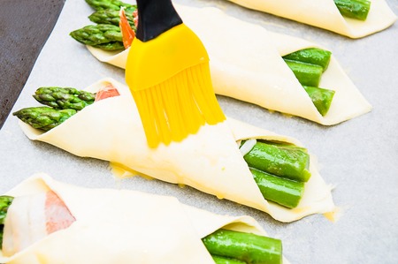 pastry filled with asparagus and prosciuttoの写真素材