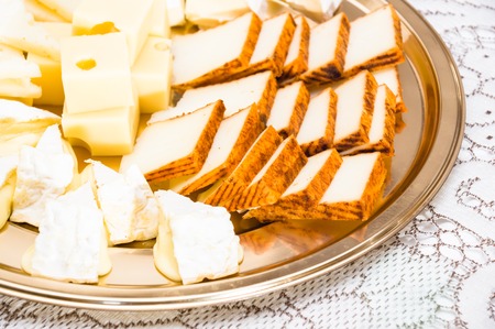 Composition with different sorts of cheesesの写真素材