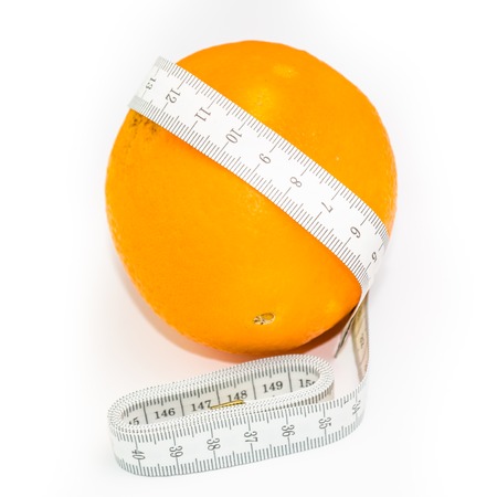 orange with measuring tapeの写真素材