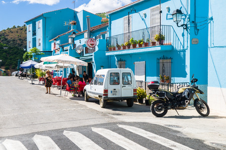 JUZCAR, SPAIN - SEPTEMBER 07: View of Juzcar on September 07, 2014 in Juzcar, Malaga, Spain. In spring 2011, buildings in the town were painted smurf-blue by Sony Pictures to celebrate the premiere of the Smurfs movie.のeditorial素材