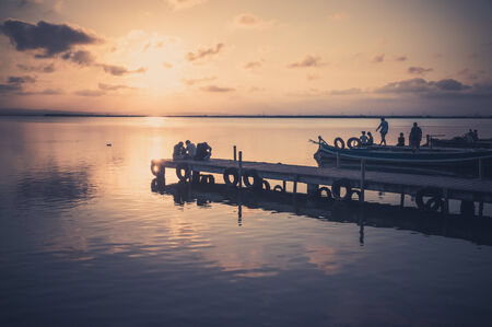 VALENCIA, SPAIN - JULY 14: Group of tourist in Albufera on July 14, 2014 in Valencia, Spain The Albufera is a freshwater lagoon and estuary on the Gulf of Valencia coast of the Valencian Community in eastern Spain.のeditorial素材