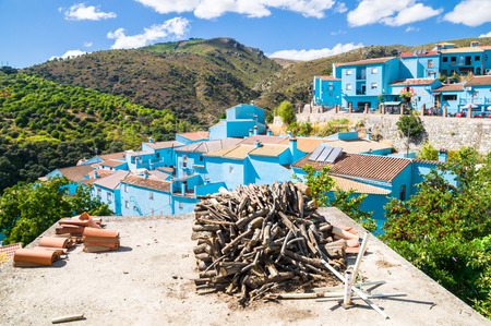 JUZCAR, SPAIN - SEPTEMBER 07: View of Juzcar on September 07, 2014 in Juzcar, Malaga, Spain. In spring 2011, buildings in the town were painted smurf-blue by Sony Pictures to celebrate the premiere of the Smurfs movie.のeditorial素材