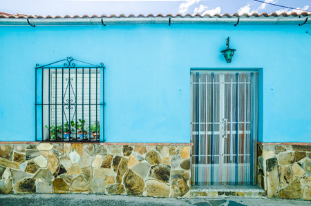 JUZCAR, SPAIN - SEPTEMBER 07: View of Juzcar on September 07, 2014 in Juzcar, Malaga, Spain. In spring 2011, buildings in the town were painted smurf-blue by Sony Pictures to celebrate the premiere of the Smurfs movie.のeditorial素材