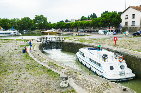 CARCASSONNE,FRANCE - JULY  25: boats anchored at the famous Canal du Midi  on July 25, 2014 in Carcassonne, France. The Canal is a 241 km (150 mi) long canal in Southern France.のeditorial素材