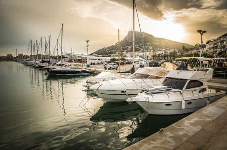L'ESTARTIT, SPAIN - JULY 18: View of L'Estartit in Costa Brava on July 18, 2014 in L'Estartit, Girona, Spain. The town is situated between the foothills of the MontgrÃ­ Massif and the Mediterranean Sea.のeditorial素材