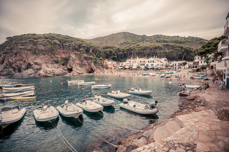 COSTA BRAVA, SPAIN - JULY 19: : Tourists relax on July 19, 2014 in Girona, Catalonia, Spain. The Costa Brava is a popular tourist region that welcomes millions of people annually.のeditorial素材