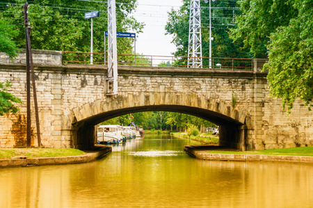 CARCASSONNE,FRANCE - JULY  25: boats anchored at the famous Canal du Midi  on July 25, 2014 in Carcassonne, France. The Canal is a 241 km (150 mi) long canal in Southern France.のeditorial素材