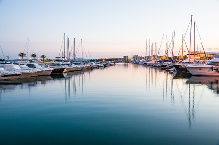 L'ESTARTIT, SPAIN - JULY 22: A view of L'Estartit port on July 12, 2014 L'Estartit, Girona, Catalonia Spain. This nautical port has berths for 300 boats.のeditorial素材