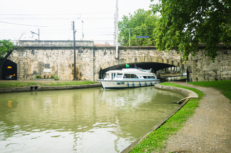 CARCASSONNE,FRANCE - JULY  25: boats anchored at the famous Canal du Midi  on July 25, 2014 in Carcassonne, France. The Canal is a 241 km (150 mi) long canal in Southern France.のeditorial素材