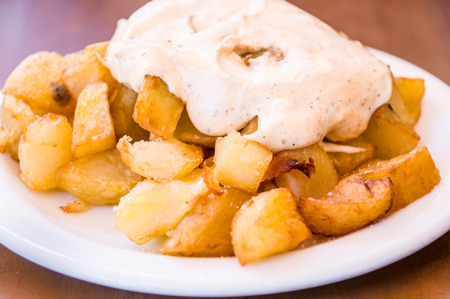 typical spanish patatas bravas, spicy potatoesの写真素材