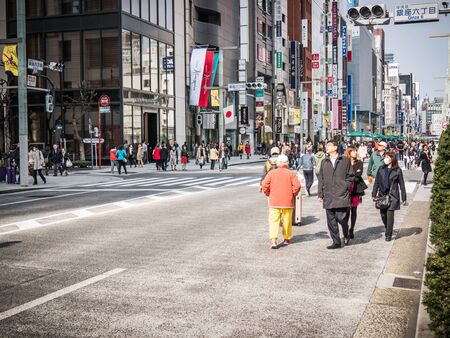 TOKYO, JAPAN - MARCH 20: Ginza district on March 20, 2015 in Tokyo, Japan. It is one of the world's best known shopping districts.のeditorial素材