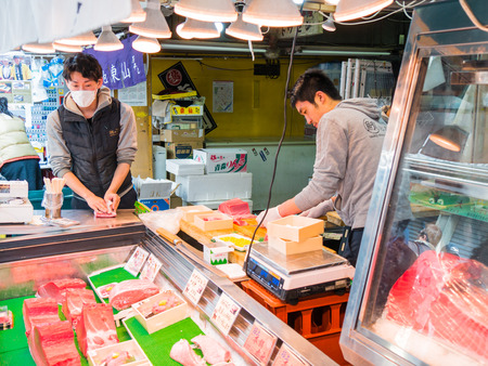 TOKYO, JAPAN - MARCH 20: Tsukiji Outer Market on March 20, 2015 in Tokyo, Japan. Tsukiji Market is the biggest wholesale fish market in the world.のeditorial素材