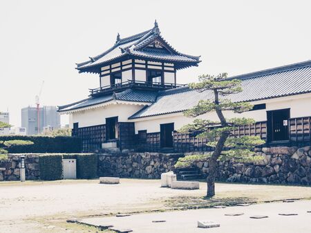 HIROSHIMA, JAPAN - MARCH 27: Hiroshima Castle on March 27, 2015 in Hiroshima, Japan. The castle was constructed in the 1590s, but was destroyed by the atomic bombing on 6 August 1945. It was rebuilt in 1958.のeditorial素材