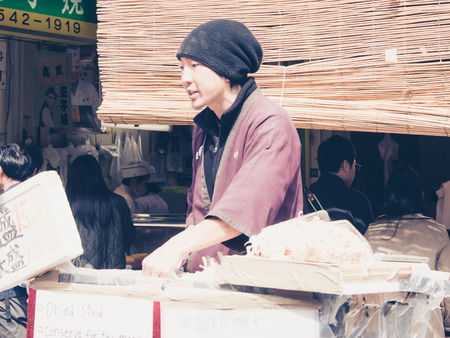 TOKYO, JAPAN - MARCH 20: Tsukiji Outer Market on March 20, 2015 in Tokyo, Japan. Tsukiji Market is the biggest wholesale fish market in the world.のeditorial素材