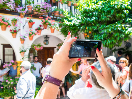 CORDOBA, SPAIN - MAY 09: Visitors during the Festival of the Patios on May 09, 2015 in Cordoba, Spain. The historic centre was named a UNESCO World Heritage Site.のeditorial素材