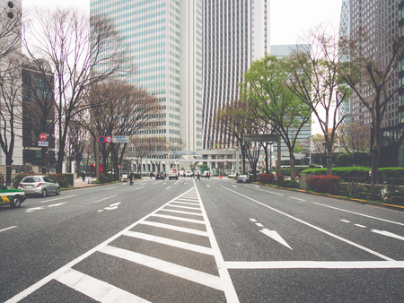 TOKYO, JAPAN - MARCH 31: Skyscraper district on March 31, 2015 in Tokyo, Japan. It is one of the 47 prefectures of Japan, and is both the capital and largest city of Japan. The Greater Tokyo Area is the most populous metropolitan area in the world.のeditorial素材