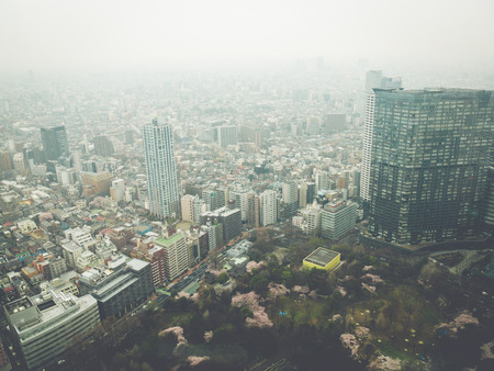 TOKYO, JAPAN - MARCH 31: Skyscraper district on March 31, 2015 in Tokyo, Japan. It is one of the 47 prefectures of Japan, and is both the capital and largest city of Japan. The Greater Tokyo Area is the most populous metropolitan area in the world.のeditorial素材