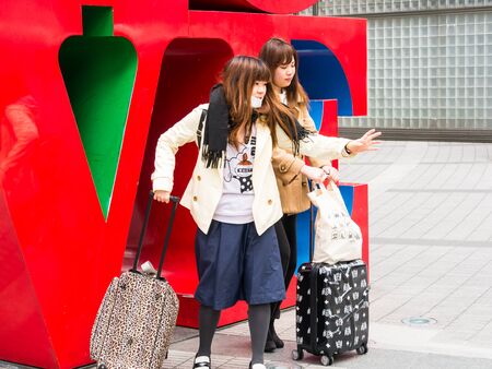 TOKYO, JAPAN - MARCH 31: Love Sculpture on March 31, 2015 in Tokyo, Japan.Designed by Robert Indiana sculpture is a part of Shinjuku I-Land public art project.のeditorial素材