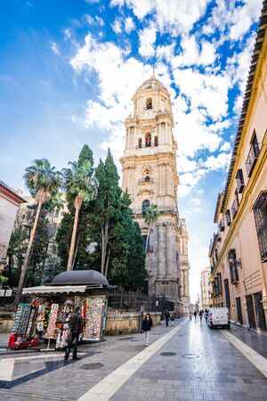 MALAGA, SPAIN - JANUARY 16: City street with tourists at daytime on January 16 in Malaga, Spain. It is the second most populous city of Andalusia and the sixth largest in Spain.のeditorial素材