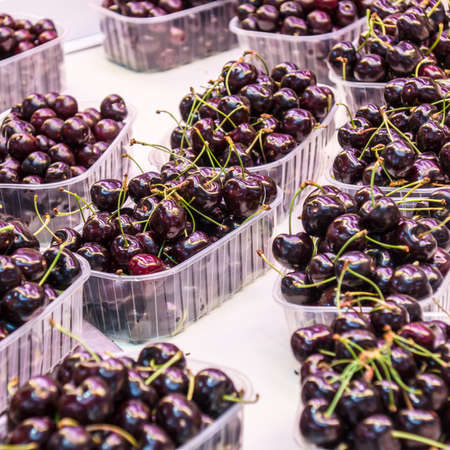 cherries in a marketの写真素材