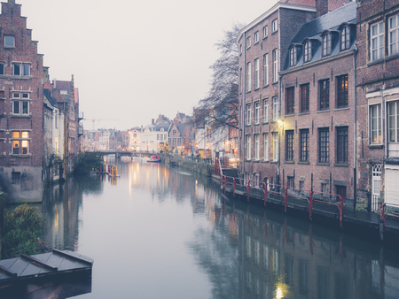GHENT, BELGIUM - DECEMBER 11: River reflection at night on December 11 in Ghent, Belgium.のeditorial素材