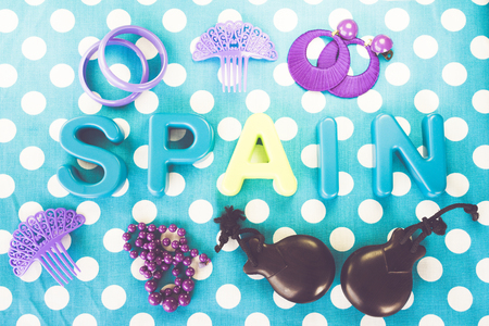 Spain made of plastic letters, castanet and costume jewelryの写真素材