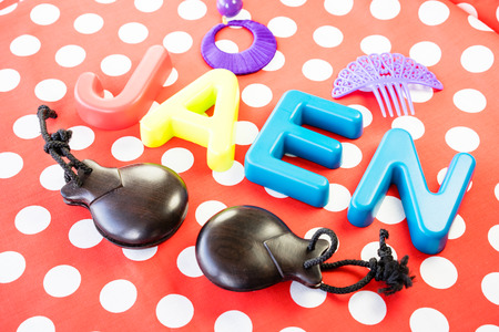 Jaen made of plastic letters, red dotted backgroundの写真素材