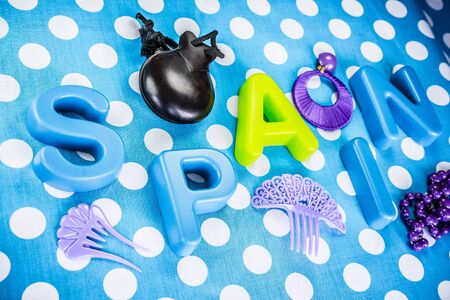 Spain made of plastic letters, castanet and costume jewelryの写真素材