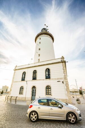 MALAGA, SPAIN - JANUARY 23: Lighthouse (Farola) in Malaga port in January 23 in Malaga, Andalusia, Spainのeditorial素材