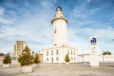 MALAGA, SPAIN - JANUARY 23: Lighthouse (Farola) in Malaga port in January 23 in Malaga, Andalusia, Spainのeditorial素材