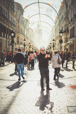 MALAGA, SPAIN - JANUARY 23: Larios Street on January 23 in Malaga, Spain. It is the second most populous city of Andalusia and the sixth largest in Spain.のeditorial素材