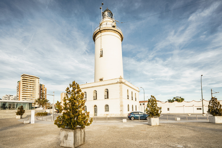 MALAGA, SPAIN - JANUARY 23: Lighthouse (Farola) in Malaga port in January 23 in Malaga, Andalusia, Spainのeditorial素材