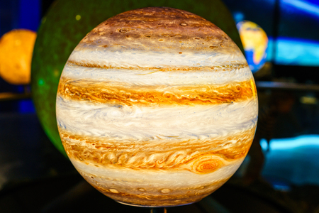 Illuminated Jupiter miniature in planetariumの写真素材