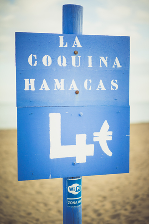 Blue billboard at the beachの写真素材