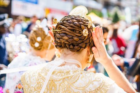 ALZIRA,SPAIN - MARCH 17: Several unidentified women walk in the offering of Fallas, one of the...