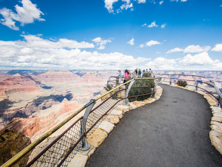 GRAND CANYON, ARIZONA, USA - SEPTEMBER 06: Unidentified person look at the Grand Canyon on September 06, 2015 in Arizona, United States. It is a steep-sided canyon carved by the Colorado River.のeditorial素材