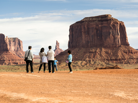 MONUMENT VALLEY, USA - SEPTEMBER 07: Unidentified tourists on September 07, 2015 in Utah, United States. It is a region of the Colorado Plateau characterized by a cluster of vast sandstone buttes.のeditorial素材