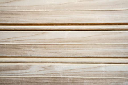 Macro of light brown wooden planks with scratchesの写真素材