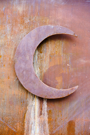 Rusty half moon on grunge wallの写真素材