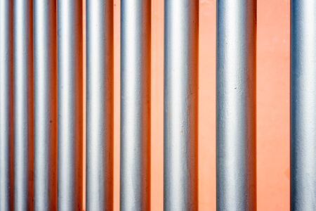 Silver and orange abstract background with repetitive pattern