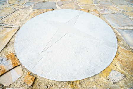 Windrose in close-up of cobbled pavement
