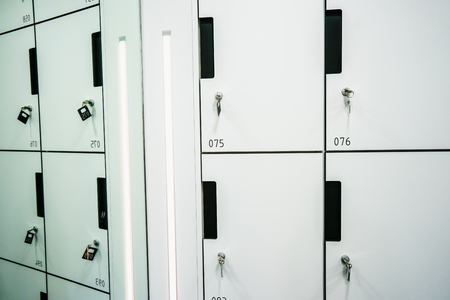 Close-up of luggage storage with keys