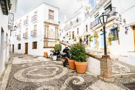 FRIGILIANA, SPAIN - JANUARY 30: picturesque street of Frigiliana on January 30, 2016 Frigiliana, Spain. It is one of beautiful white towns in Axarquia Area, Andalusia.のeditorial素材